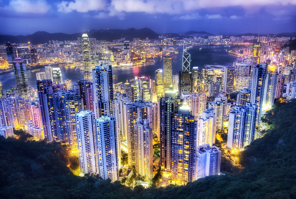 An aerial view of Hong Kong by night.